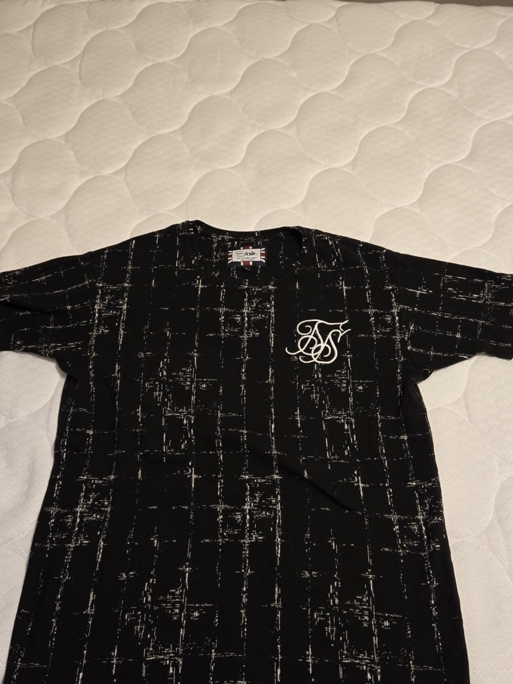 SikSilk black t-shirt featuring a white distressed pattern